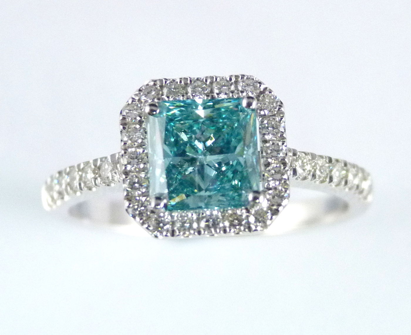 Elegant Aqua Radiance Halo Ring