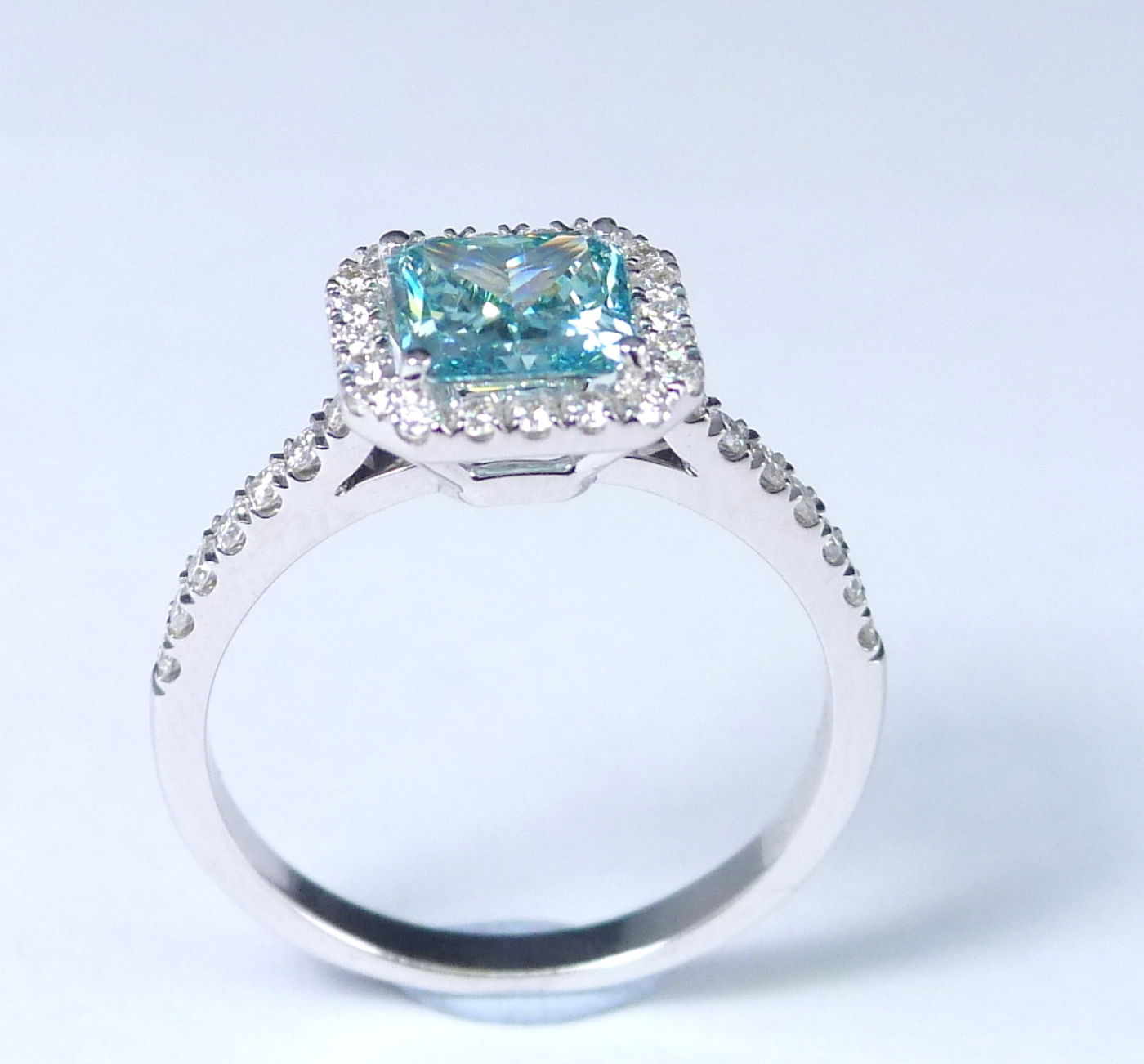 Elegant Aqua Radiance Halo Ring