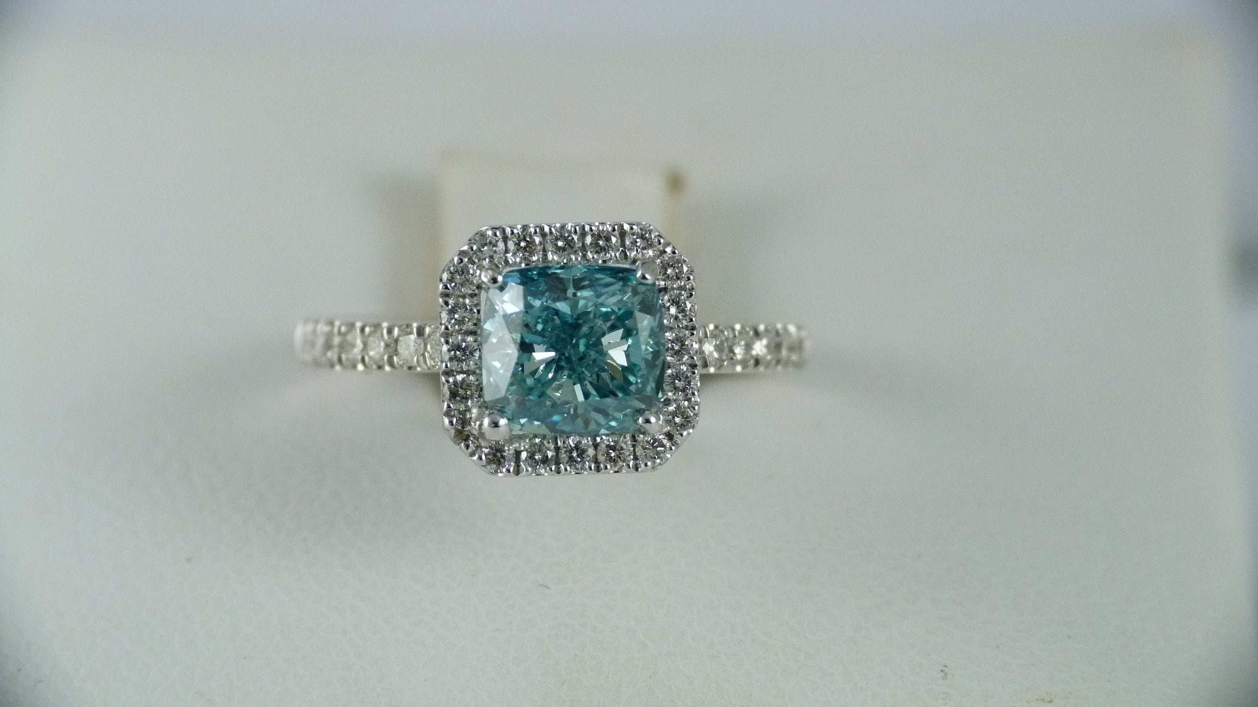 Elegant Aqua Radiance Halo Ring